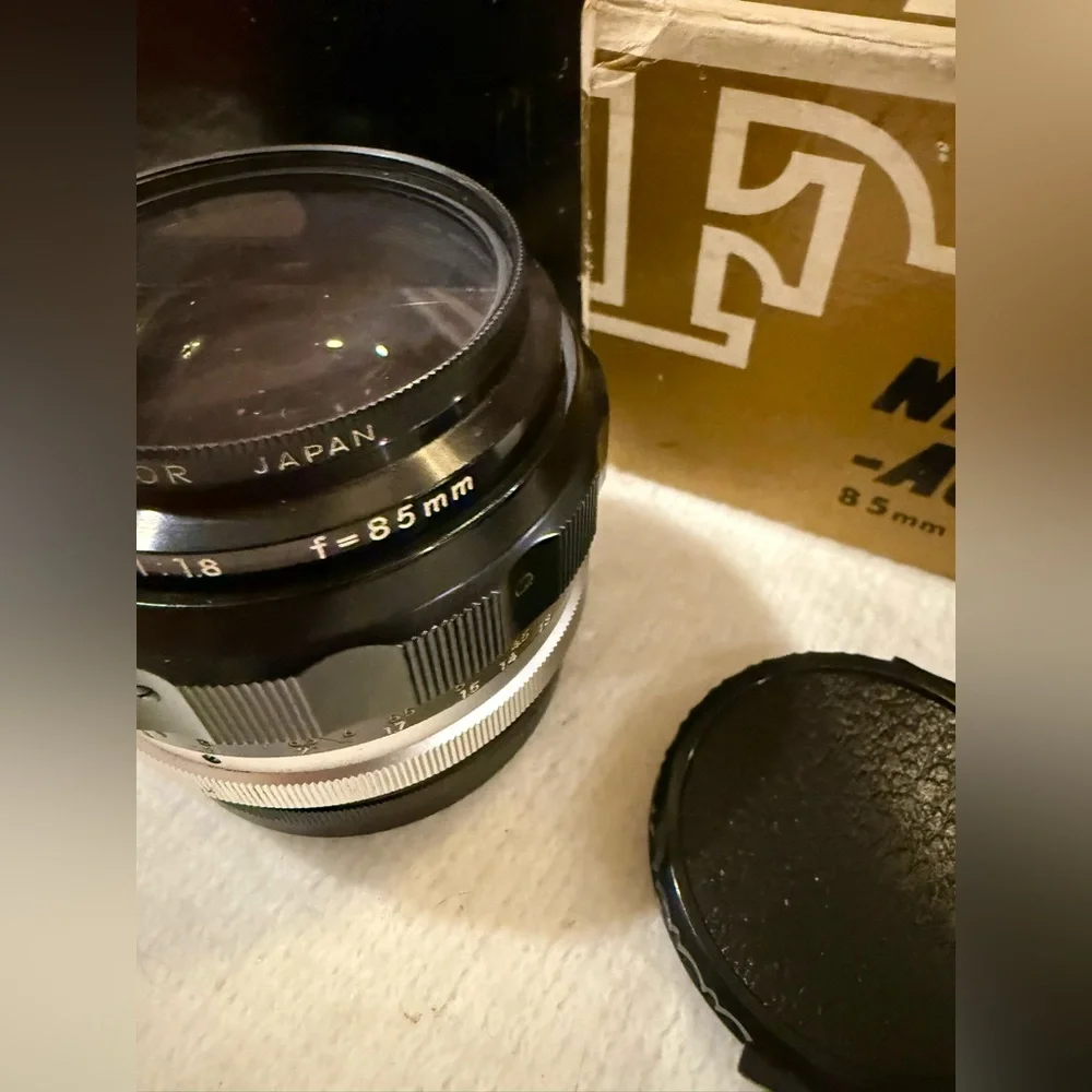 Classic Nikon 85mm F1.8 Non AI Nikkor aka “The portrait lens” w/leather case